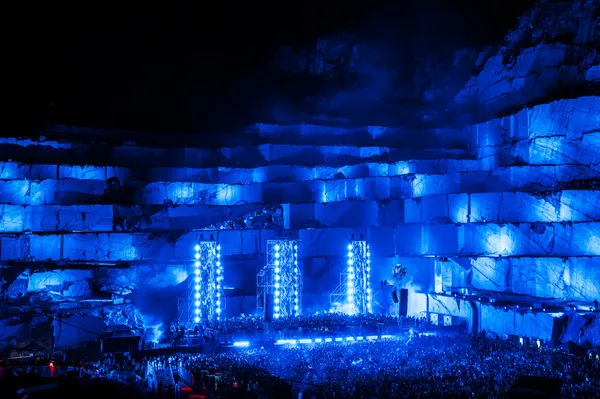 X by Adriatique electronic music event in marble quarry